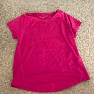 a hot pink tighter fitting girls t shirt. size L, great condition.